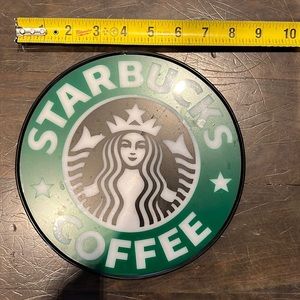 Starbucks sign with light
